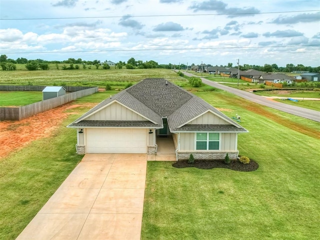 1940 Eli Ave, Tuttle, OK 73089 - view of front of house featuring a garage, brick siding, concrete driveway, roof with shingles, and board and batten siding