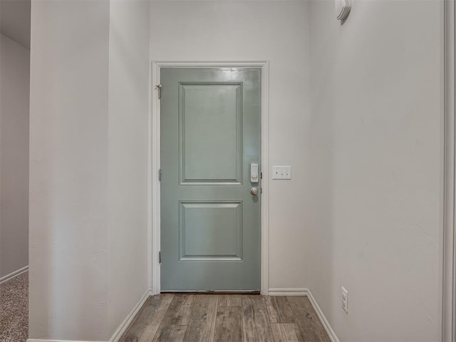 1940 Eli Ave, Tuttle, OK 73089 - entryway with baseboards and wood finished floors