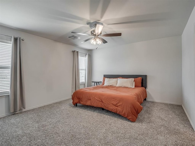 1940 Eli Ave, Tuttle, OK 73089 - bedroom featuring carpet floors, a ceiling fan, and baseboards