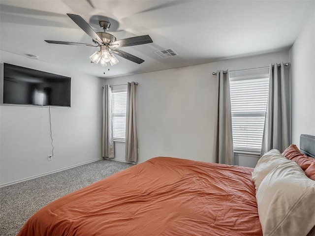 1940 Eli Ave, Tuttle, OK 73089 - bedroom with carpet floors, a ceiling fan, and baseboards