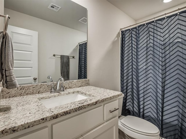 1940 Eli Ave, Tuttle, OK 73089 - full bath featuring vanity, toilet, and curtained shower