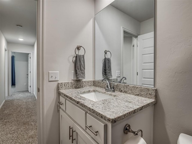 1940 Eli Ave, Tuttle, OK 73089 - half bathroom featuring vanity and toilet