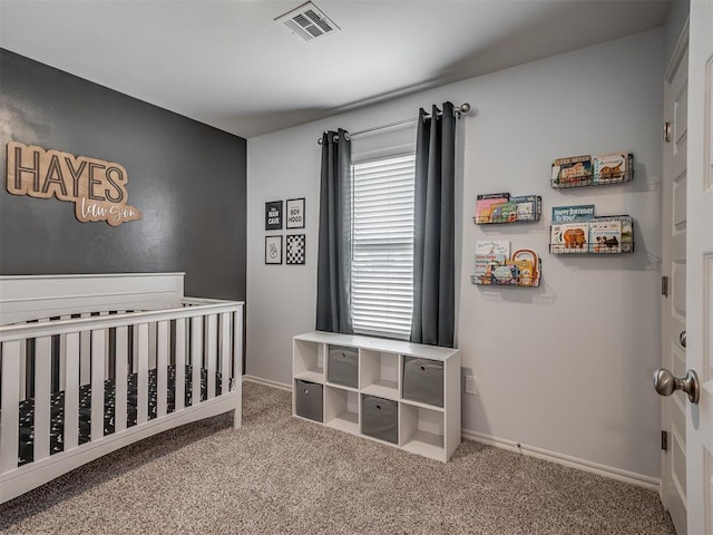 1940 Eli Ave, Tuttle, OK 73089 - bedroom featuring carpet, a nursery area, and baseboards