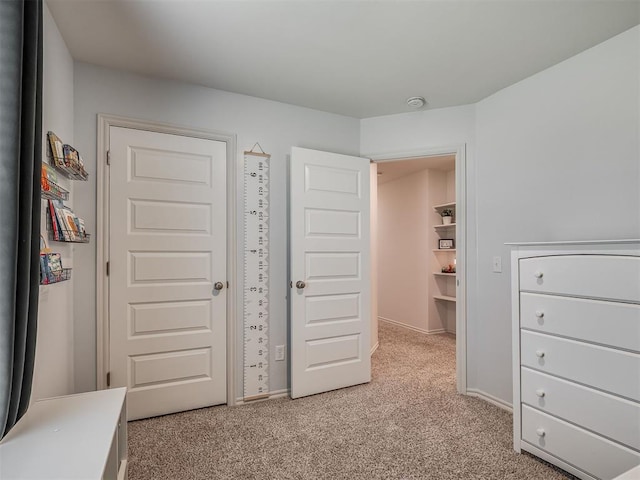 1940 Eli Ave, Tuttle, OK 73089 - bedroom with light colored carpet and baseboards