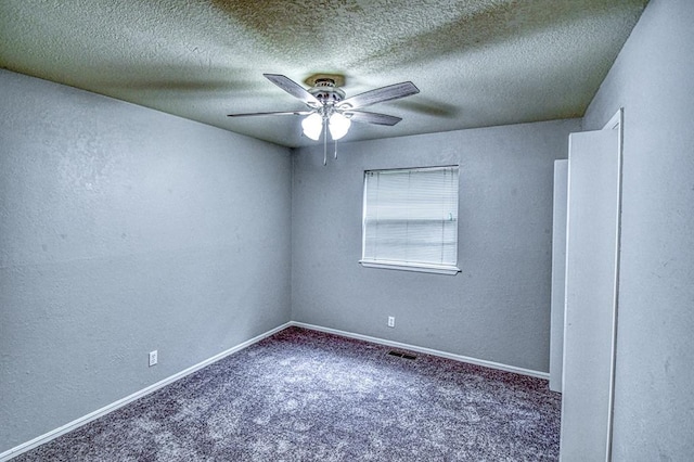1439 Greenbriar Dr, Norman, OK 73072 - carpeted spare room featuring a ceiling fan, baseboards, a textured wall, and a textured ceiling