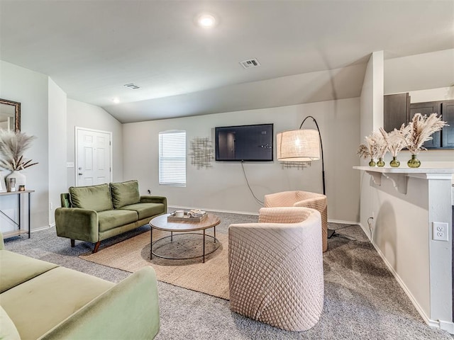 1316 Chuck Wagon Dr, El Reno, OK 73036 - carpeted living area with lofted ceiling and baseboards