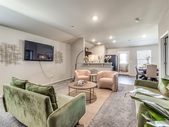 1316 Chuck Wagon Dr, El Reno, OK 73036 - living area featuring carpet flooring, vaulted ceiling, baseboards, and recessed lighting