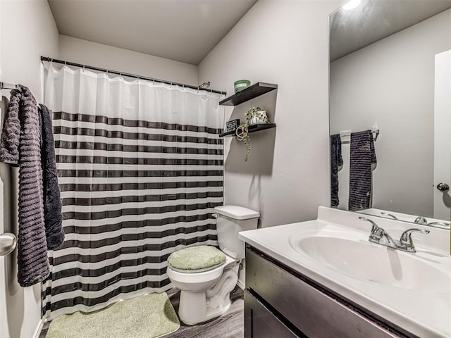 1316 Chuck Wagon Dr, El Reno, OK 73036 - full bath featuring toilet, vanity, wood finished floors, and curtained shower
