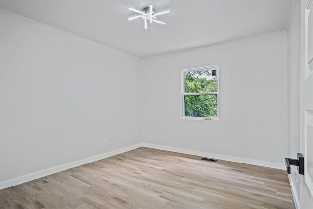 3804 NW 19th St, Oklahoma City, OK 73107 - unfurnished room featuring ornamental molding, wood finished floors, and baseboards