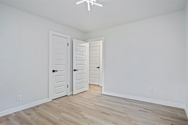 3804 NW 19th St, Oklahoma City, OK 73107 - unfurnished bedroom with crown molding, light wood-type flooring, and baseboards