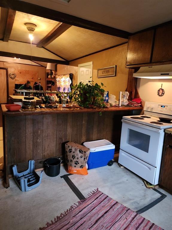 310 Mcgee St, Eufaula, OK 74432 - kitchen with white electric range, under cabinet range hood, and concrete floors