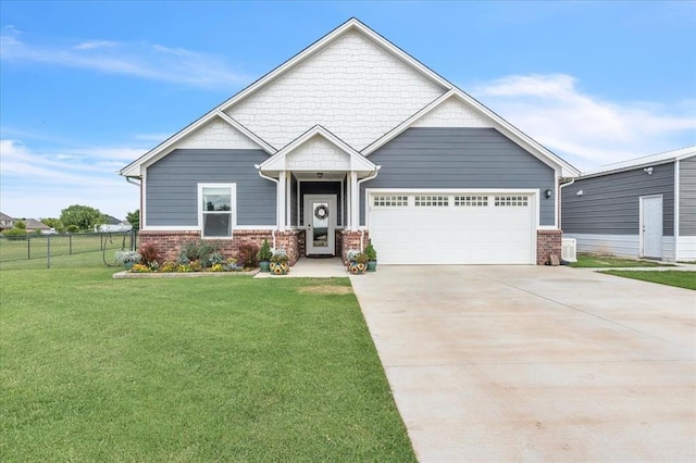 13091 Mannington Rd, Edmond, OK 73025 - craftsman inspired home featuring a garage, concrete driveway, and brick siding