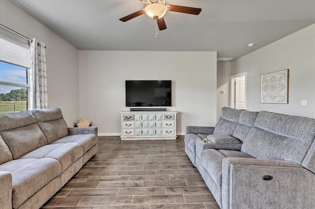 13091 Mannington Rd, Edmond, OK 73025 - living room with a ceiling fan, baseboards, and wood finished floors