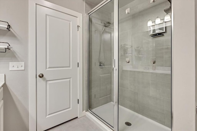 13091 Mannington Rd, Edmond, OK 73025 - full bath with a stall shower, vanity, and tile patterned floors