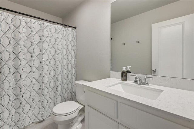 13091 Mannington Rd, Edmond, OK 73025 - full bath featuring toilet, vanity, and a shower with shower curtain