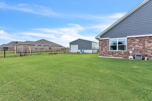 13091 Mannington Rd, Edmond, OK 73025 - view of yard featuring a garage