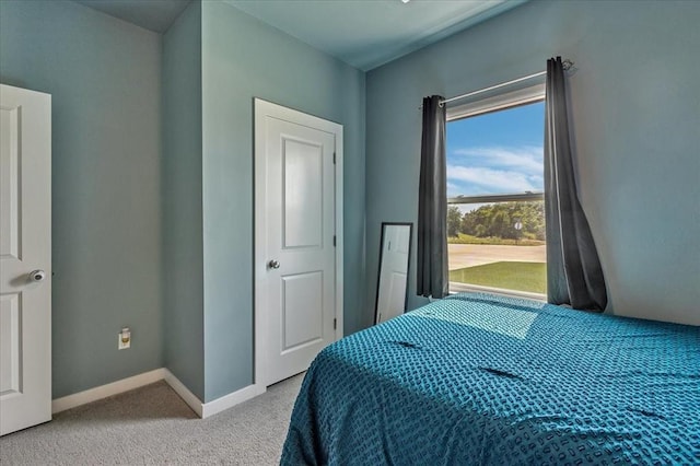 13091 Mannington Rd, Edmond, OK 73025 - carpeted bedroom featuring baseboards