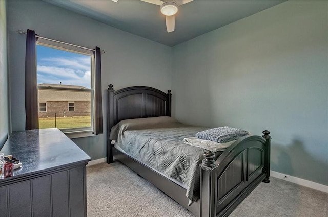 13091 Mannington Rd, Edmond, OK 73025 - bedroom featuring light colored carpet, baseboards, and ceiling fan