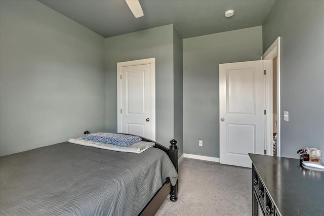 13091 Mannington Rd, Edmond, OK 73025 - bedroom with carpet flooring, ceiling fan, and baseboards