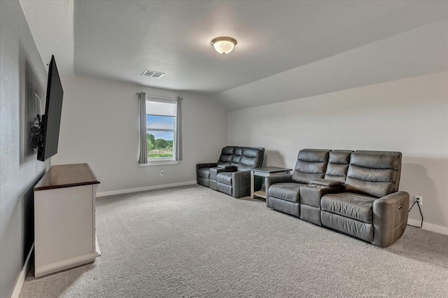 13091 Mannington Rd, Edmond, OK 73025 - home theater with lofted ceiling, baseboards, and carpet