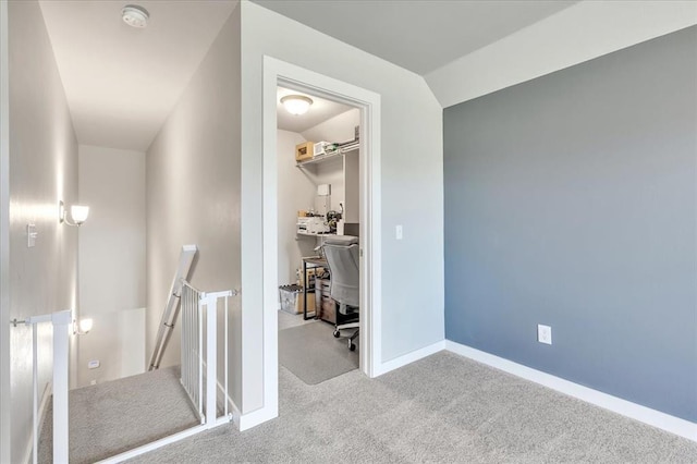 13091 Mannington Rd, Edmond, OK 73025 - corridor with an upstairs landing, carpet floors, baseboards, and an office area