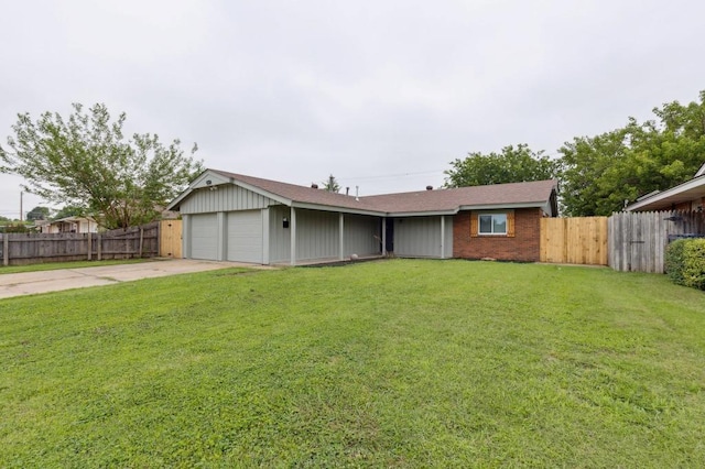 2617 SW 69th St, Oklahoma City, OK 73159 - ranch-style house with concrete driveway and a garage