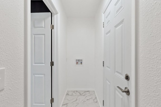 2617 SW 69th St, Oklahoma City, OK 73159 - hall with marble finish flooring and a textured wall