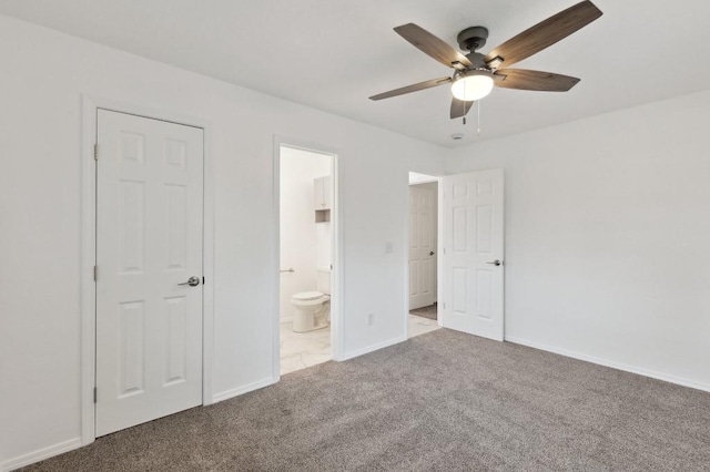 2617 SW 69th St, Oklahoma City, OK 73159 - unfurnished bedroom featuring carpet floors, ensuite bathroom, and ceiling fan