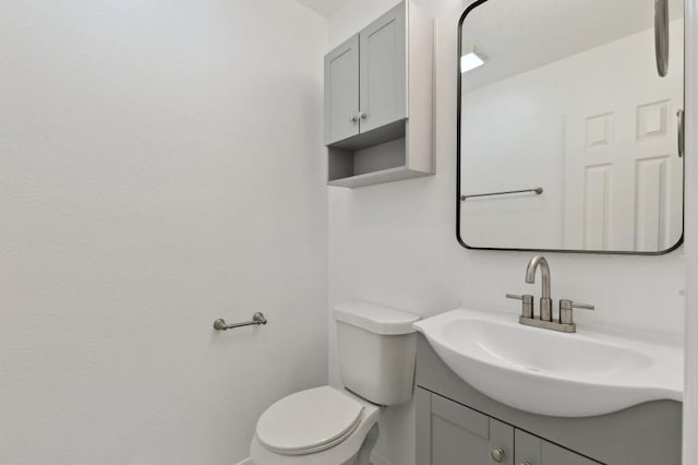 2617 SW 69th St, Oklahoma City, OK 73159 - half bathroom featuring vanity and toilet