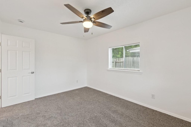 2617 SW 69th St, Oklahoma City, OK 73159 - empty room featuring carpet flooring, ceiling fan, and a smoke detector