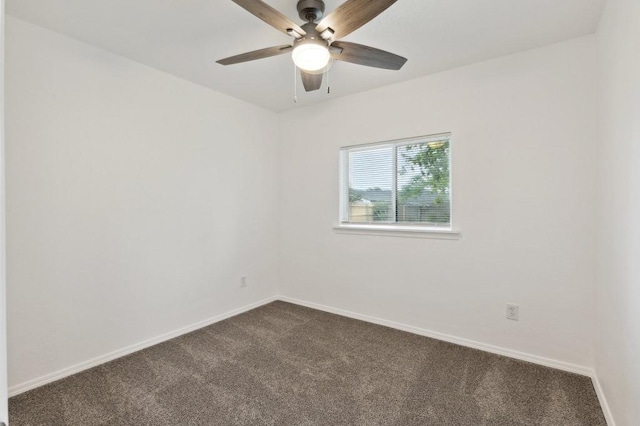 2617 SW 69th St, Oklahoma City, OK 73159 - empty room with dark colored carpet and a ceiling fan