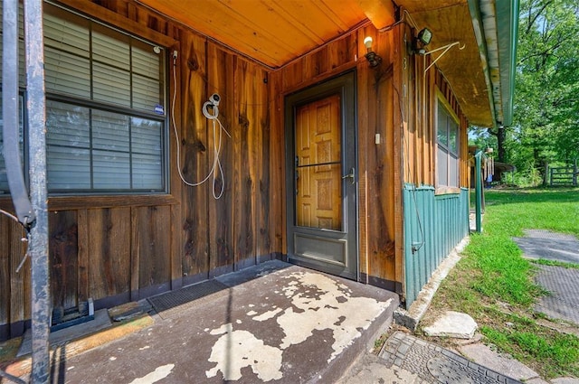 431 Canoe Rd, Broken Bow, OK 74728 - view of exterior entry with a porch and board and batten siding