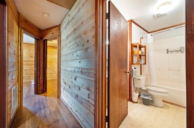 431 Canoe Rd, Broken Bow, OK 74728 - hallway with wooden walls and tile patterned floors