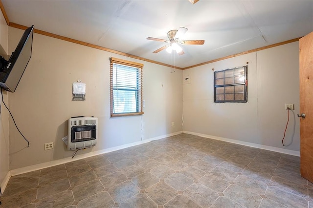 431 Canoe Rd, Broken Bow, OK 74728 - spare room featuring heating unit, a ceiling fan, crown molding, and baseboards
