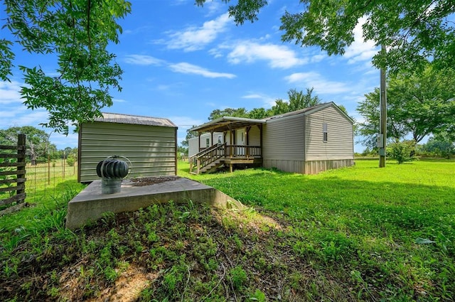 2991 Peavey Xing, Broken Bow, OK 74728 - rear view of house featuring covered porch