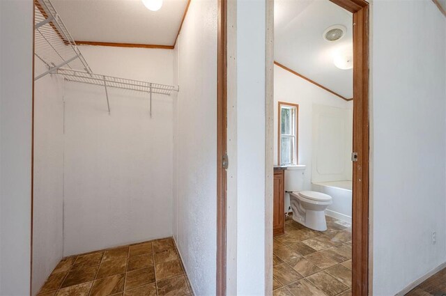 2991 Peavey Xing, Broken Bow, OK 74728 - walk in closet with stone finish flooring
