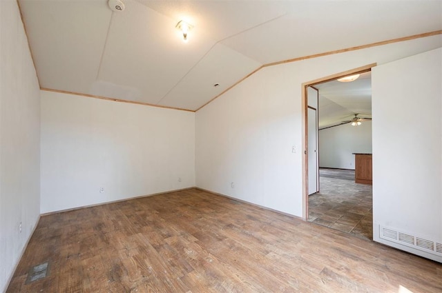 2991 Peavey Xing, Broken Bow, OK 74728 - empty room featuring lofted ceiling, wood finished floors, and a ceiling fan