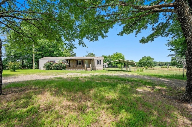 2991 Peavey Xing, Broken Bow, OK 74728 - view of front facade featuring a carport, driveway, and covered porch