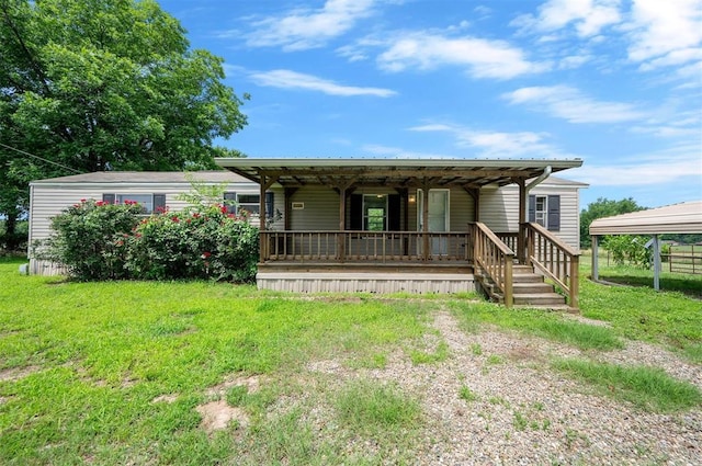 2991 Peavey Xing, Broken Bow, OK 74728 - view of front of property featuring metal roof, covered porch, and a front lawn