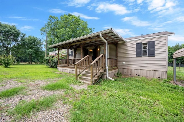 2991 Peavey Xing, Broken Bow, OK 74728 - manufactured / mobile home featuring a front lawn
