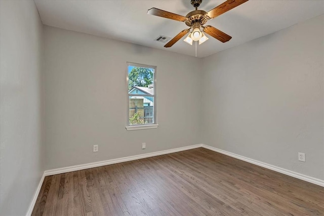 2901 Pine Ave, Oklahoma City, OK 73126 - unfurnished room featuring wood finished floors and a ceiling fan
