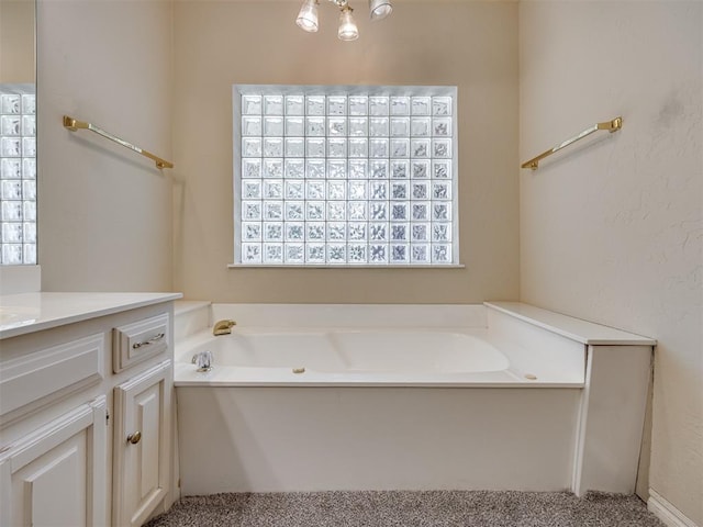 3713 Barwick Ct, Norman, OK 73072 - bathroom featuring a bath, vanity, and healthy amount of natural light