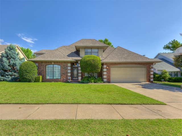 3713 Barwick Ct, Norman, OK 73072 - view of front facade featuring an attached garage, brick siding, a front lawn, concrete driveway, and roof with shingles