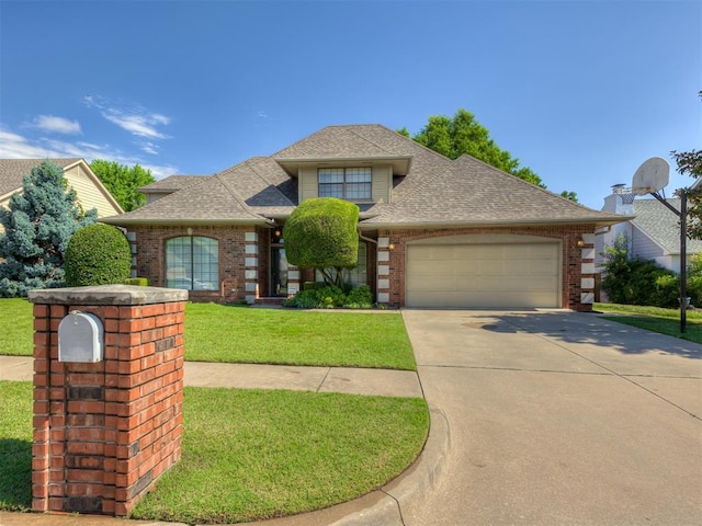3713 Barwick Ct, Norman, OK 73072 - view of front of home with brick siding, a shingled roof, an attached garage, driveway, and a front lawn