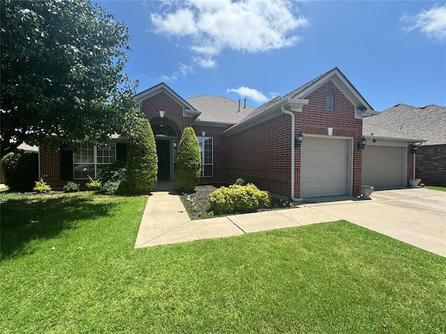 4409 Whitmere Ct, Norman, OK 73072 - view of front of property with an attached garage, brick siding, a front yard, and concrete driveway