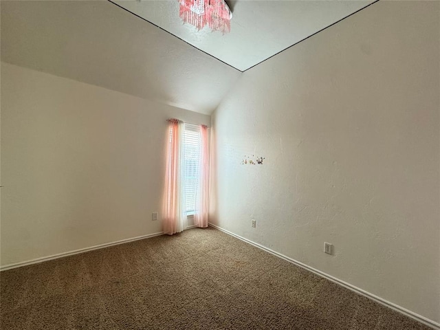 4409 Whitmere Ct, Norman, OK 73072 - carpeted empty room featuring lofted ceiling and baseboards