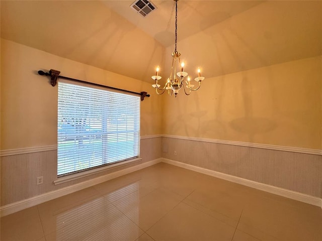 4409 Whitmere Ct, Norman, OK 73072 - tiled spare room featuring vaulted ceiling, a chandelier, a wainscoted wall, and wood walls