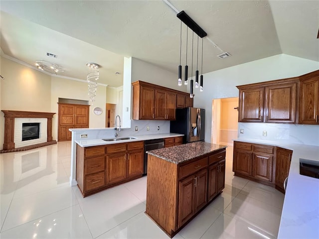4409 Whitmere Ct, Norman, OK 73072 - kitchen featuring fridge with ice dispenser, dishwasher, a kitchen island, decorative light fixtures, and light tile patterned floors