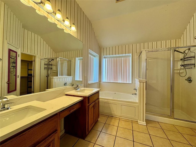 4409 Whitmere Ct, Norman, OK 73072 - bathroom with vaulted ceiling, wallpapered walls, tile patterned floors, a stall shower, and a garden tub