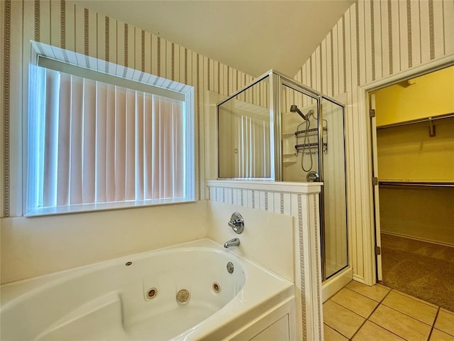 4409 Whitmere Ct, Norman, OK 73072 - full bath with wallpapered walls, a stall shower, tile patterned flooring, a jetted tub, and a spacious closet